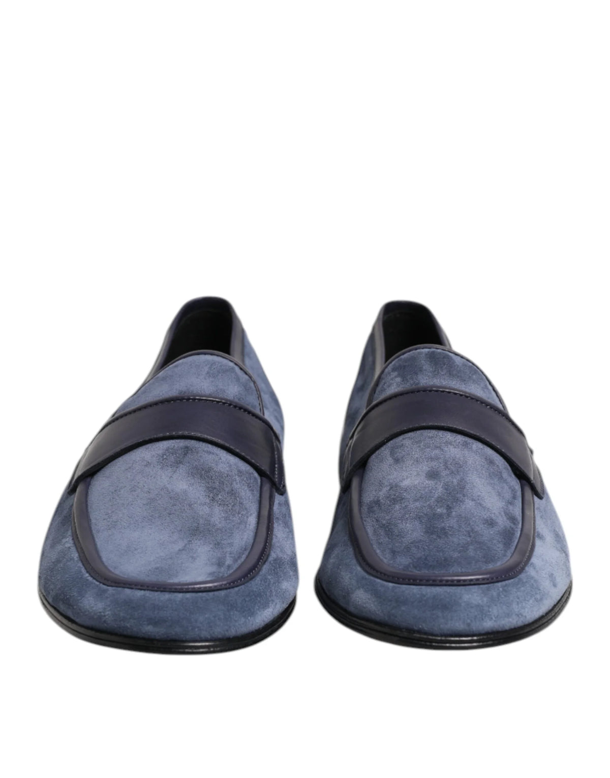 Dolce & Gabbana blue suede loafers with black leather trim and silver-tone logo hardware, front view.