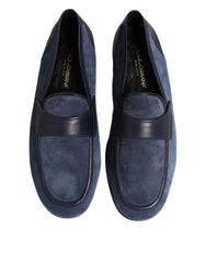 Side profile of Dolce & Gabbana men's moccasins in premium blue calfskin suede with a sleek black sole.