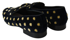 Dolce & Gabbana men's formal slippers in deep blue cotton velvet featuring an embroidered gold crown crest.