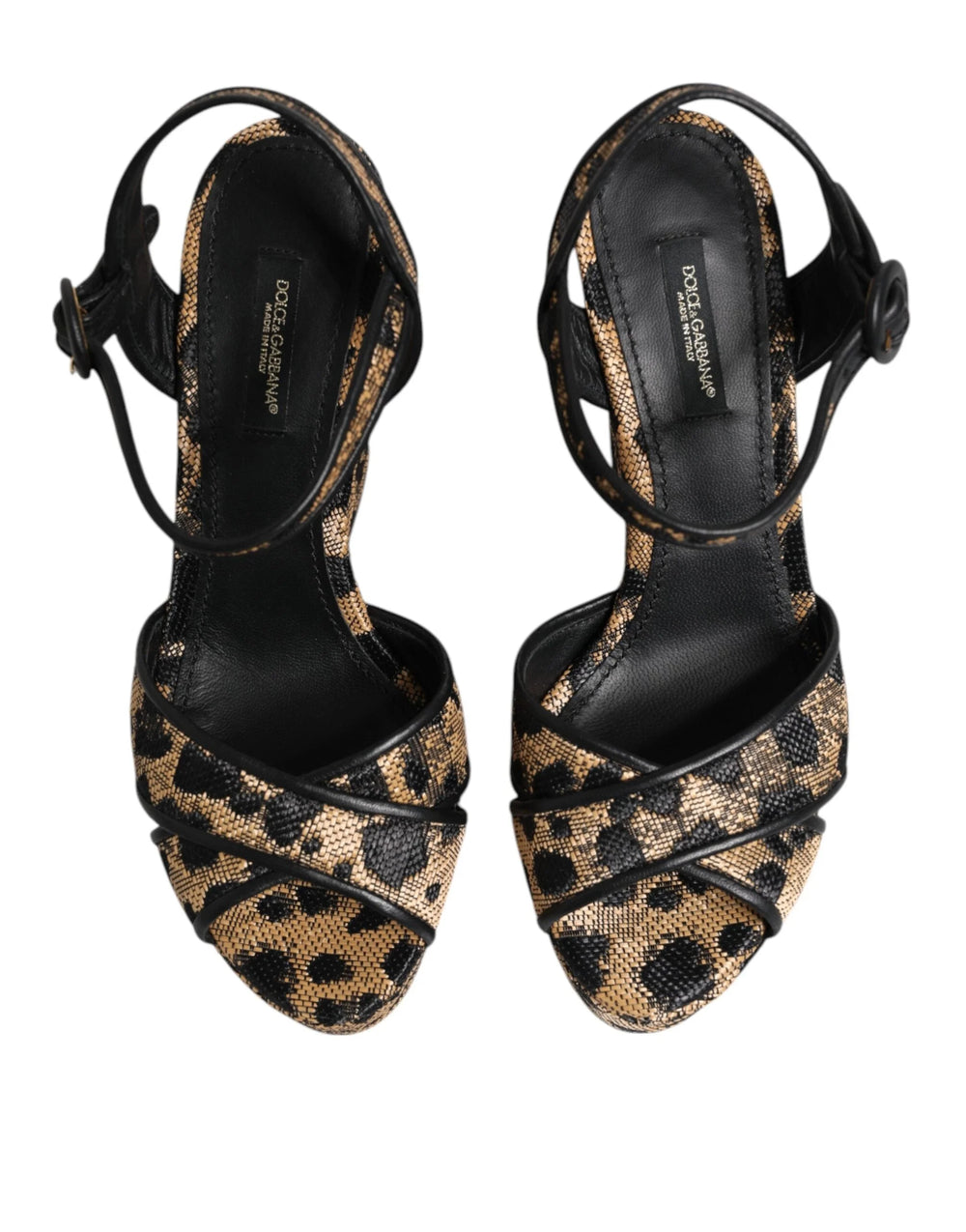 Zijaanzicht van Dolce & Gabbana bruine leopard print wedges met een hoog platform en slanke lederen bandjes.