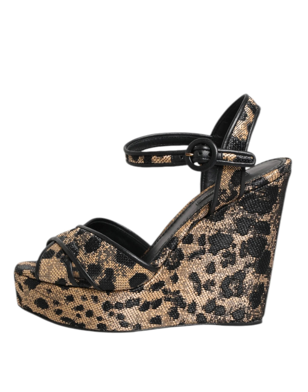Close-up van de leopard print viscose en polyester textieltextuur op het Dolce & Gabbana wedge platform.