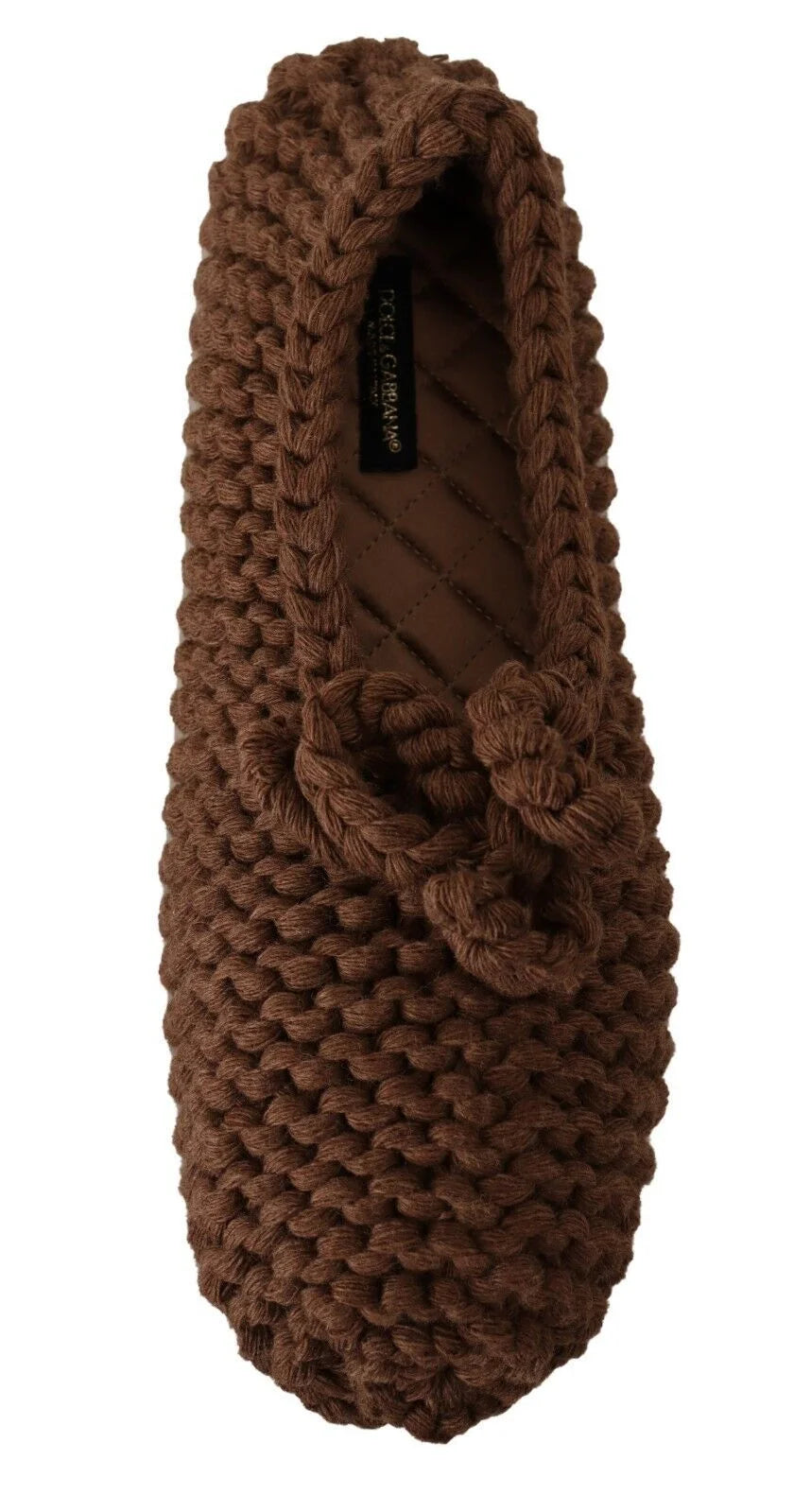 Εικόνα από ψηλά των καφέ δερμάτινων ballet flats Dolce & Gabbana από μαλλί, που δείχνουν το άνετο εσωτερικό και το κλασικό αμυγδαλωτό μπροστινό μέρος.