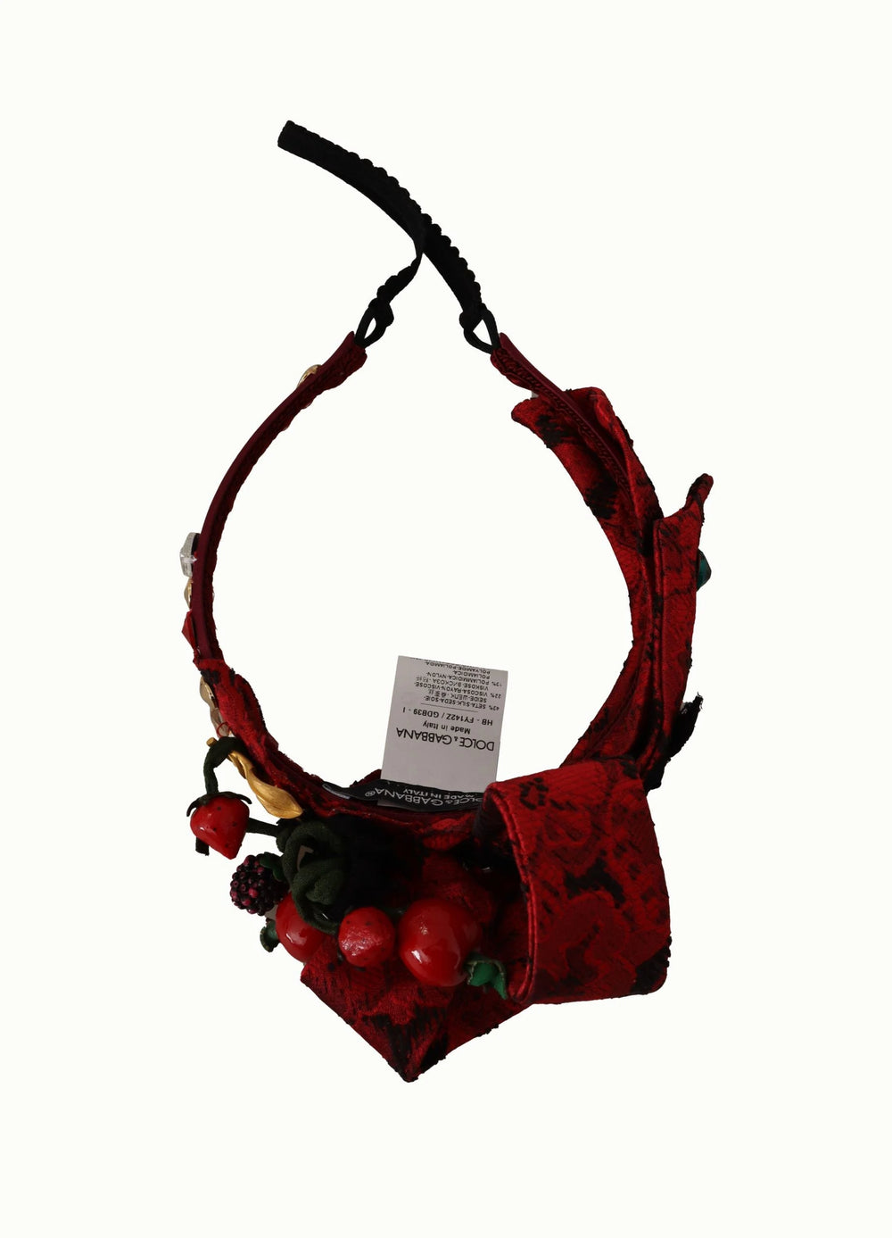 Vue latérale du serre-tête en soie Dolce & Gabbana rouge cerise, sélectionné par AmeOro, avec son nœud en cristal raffiné.