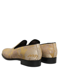 Top-down view of Dolce & Gabbana jacquard loafers featuring the quilted silk lining and branded leather insole.