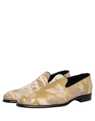Rear view of the Dolce & Gabbana gold floral shoes highlighting the structured heel and premium textile finish.