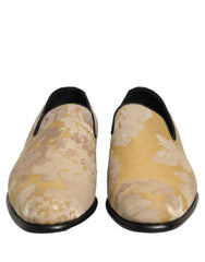 Dolce & Gabbana men's loafers in gold floral print jacquard with elegant slip-on silhouette and leather soles.