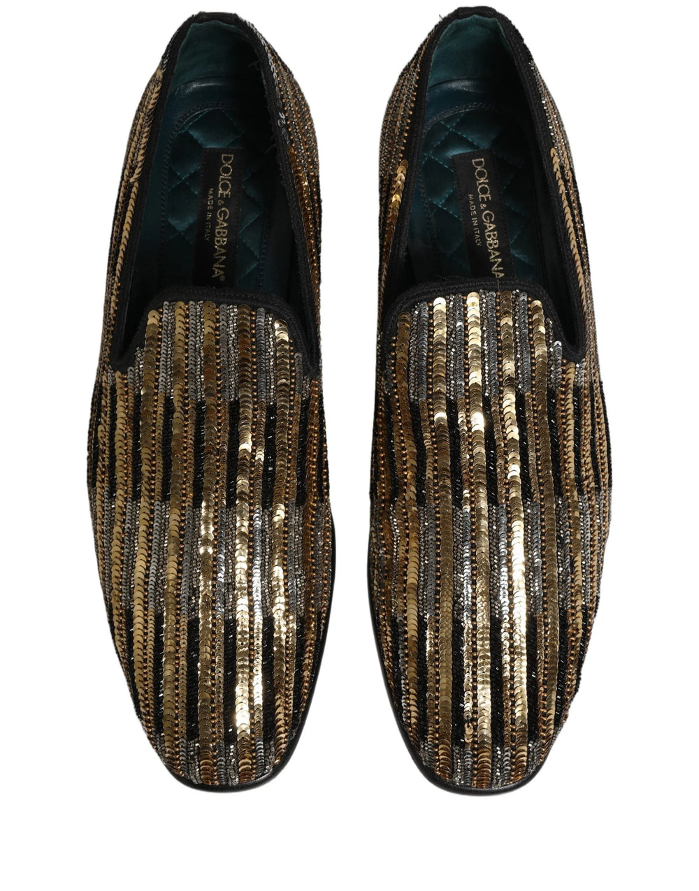 Vue arrière des mocassins dorés Dolce & Gabbana, soulignant le contre-talon structuré et le placement méticuleux des sequins.