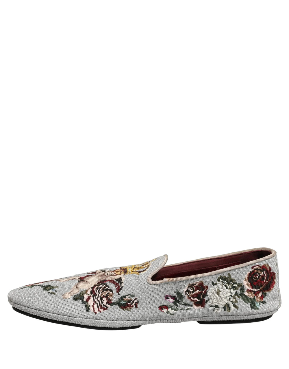 Felülnézet a Dolce & Gabbana cipőkről, a párnázott bőr talpbetétet és a márkajelzést mutatja be, a kifinomult kényelem érdekében.
