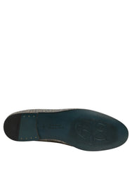 Dolce & Gabbana heren dress loafers in grijs lurex glitter met een strakke amandelteen en leren zolen.