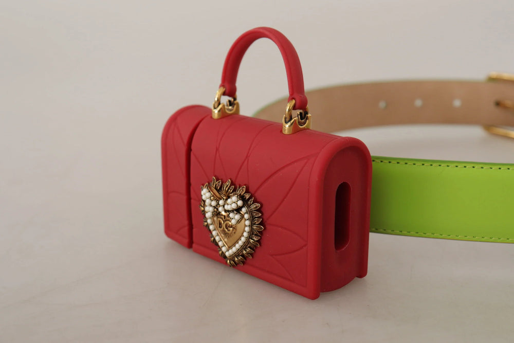 Close-up of the iconic gold-tone Devotion heart buckle on the green leather Dolce & Gabbana micro bag belt.
