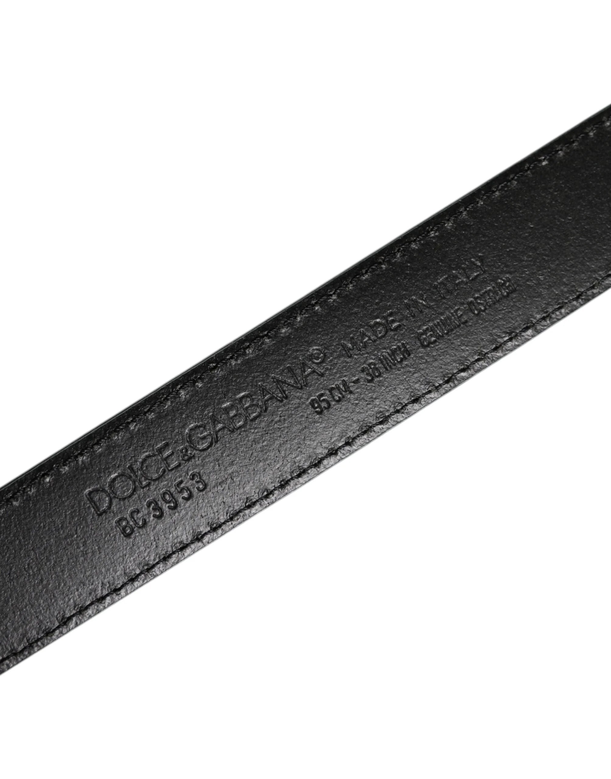 Detailed view of the ostrich leather pores and the refined craftsmanship of the Dolce & Gabbana belt strap.