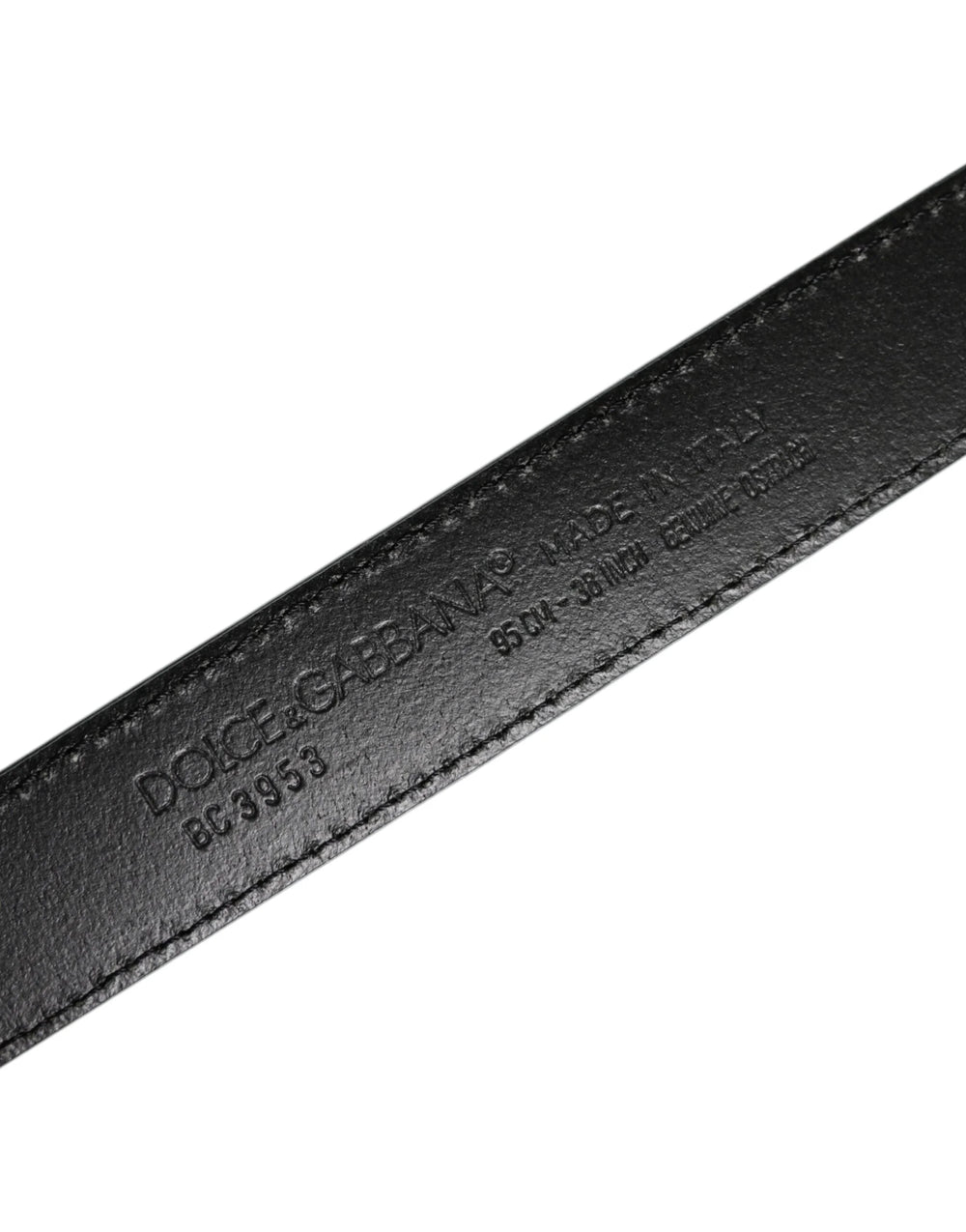 Detailed view of the ostrich leather pores and the refined craftsmanship of the Dolce & Gabbana belt strap.