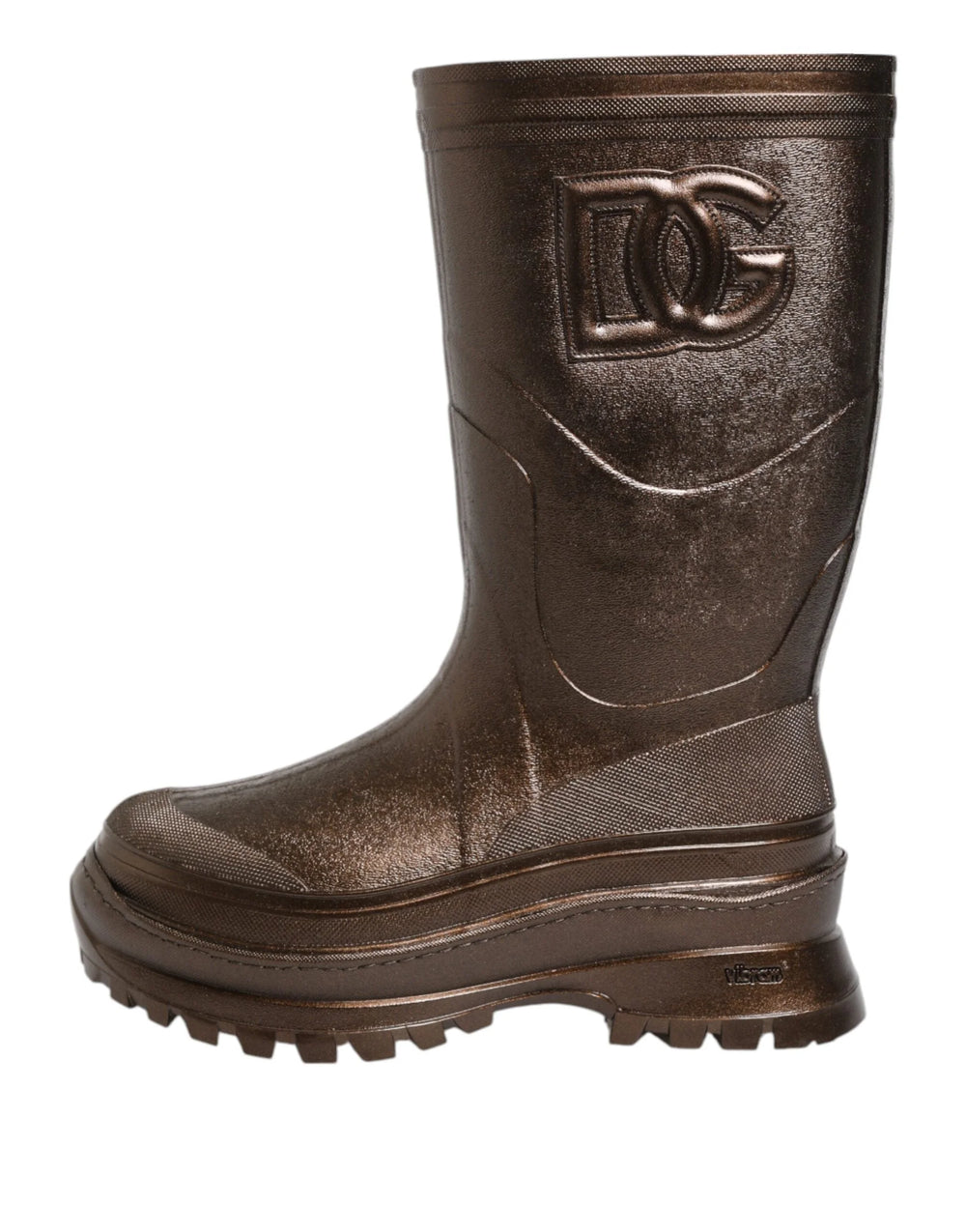 Närbild av den texturerade gummisulan på Dolce & Gabbanas metalliska stövlar designade för grepp och livslängd.