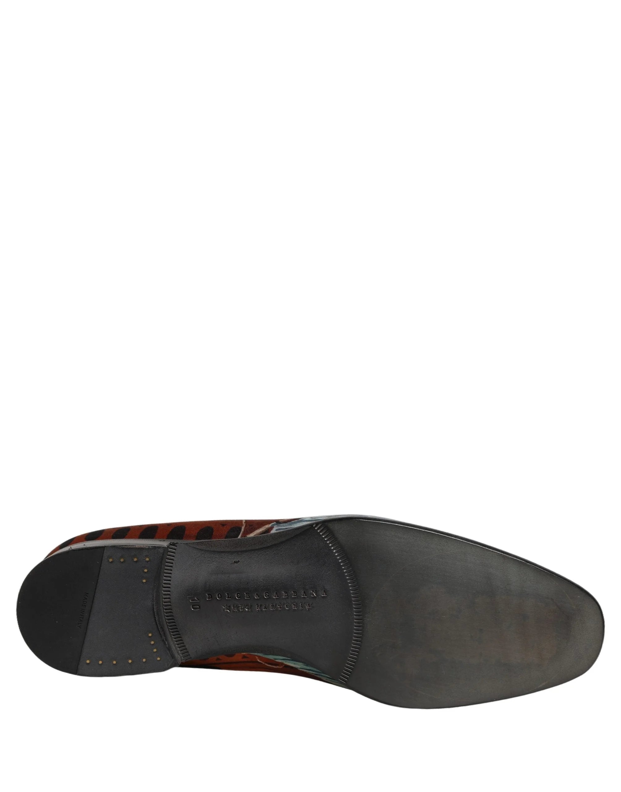 Mocassins slip-on multicolor da Dolce & Gabbana para homem com estampado de leão em couro num padrão artístico vibrante.