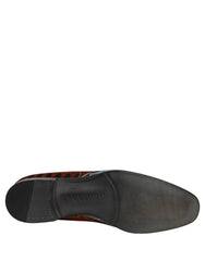 Mocassins slip-on multicolor da Dolce & Gabbana para homem com estampado de leão em couro num padrão artístico vibrante.