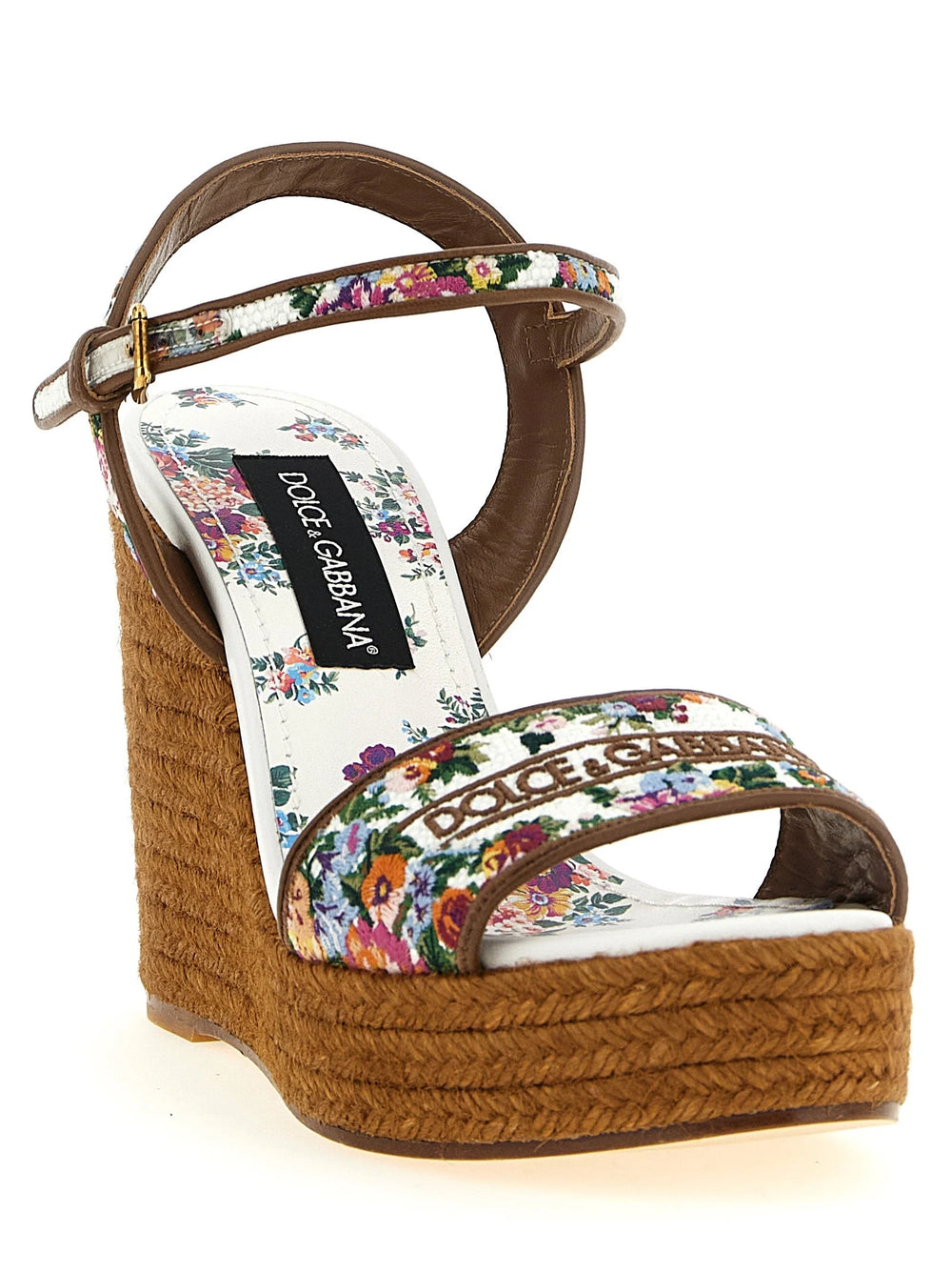 Sideprofil av Dolce & Gabbana wedge sandaler som viser arkitektonisk hælhøyde og elegant ankelremdesign.