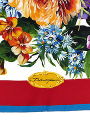 Side view of the folded Dolce & Gabbana silk scarf showcasing the intricate pattern and lustrous fabric drape.