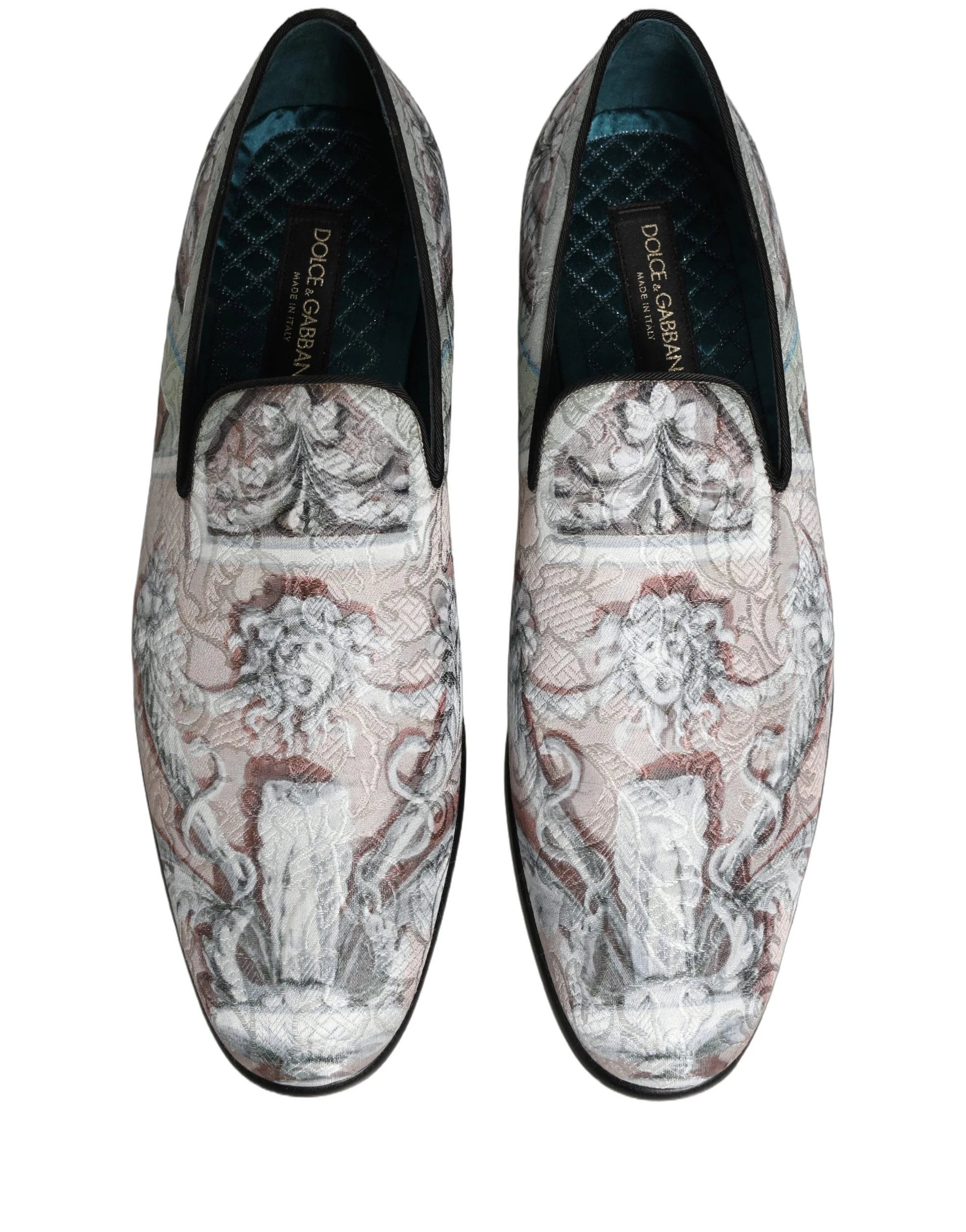 Bagsiden af barokprint loafers, der fremhæver den strukturerede hæl og det præcise italienske håndværk.