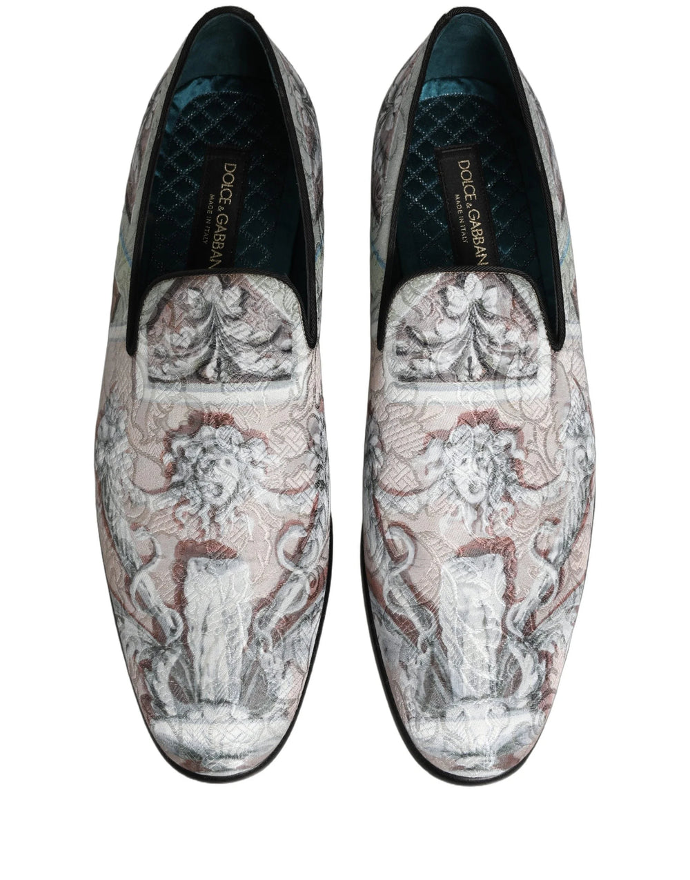 Bagsiden af barokprint loafers, der fremhæver den strukturerede hæl og det præcise italienske håndværk.