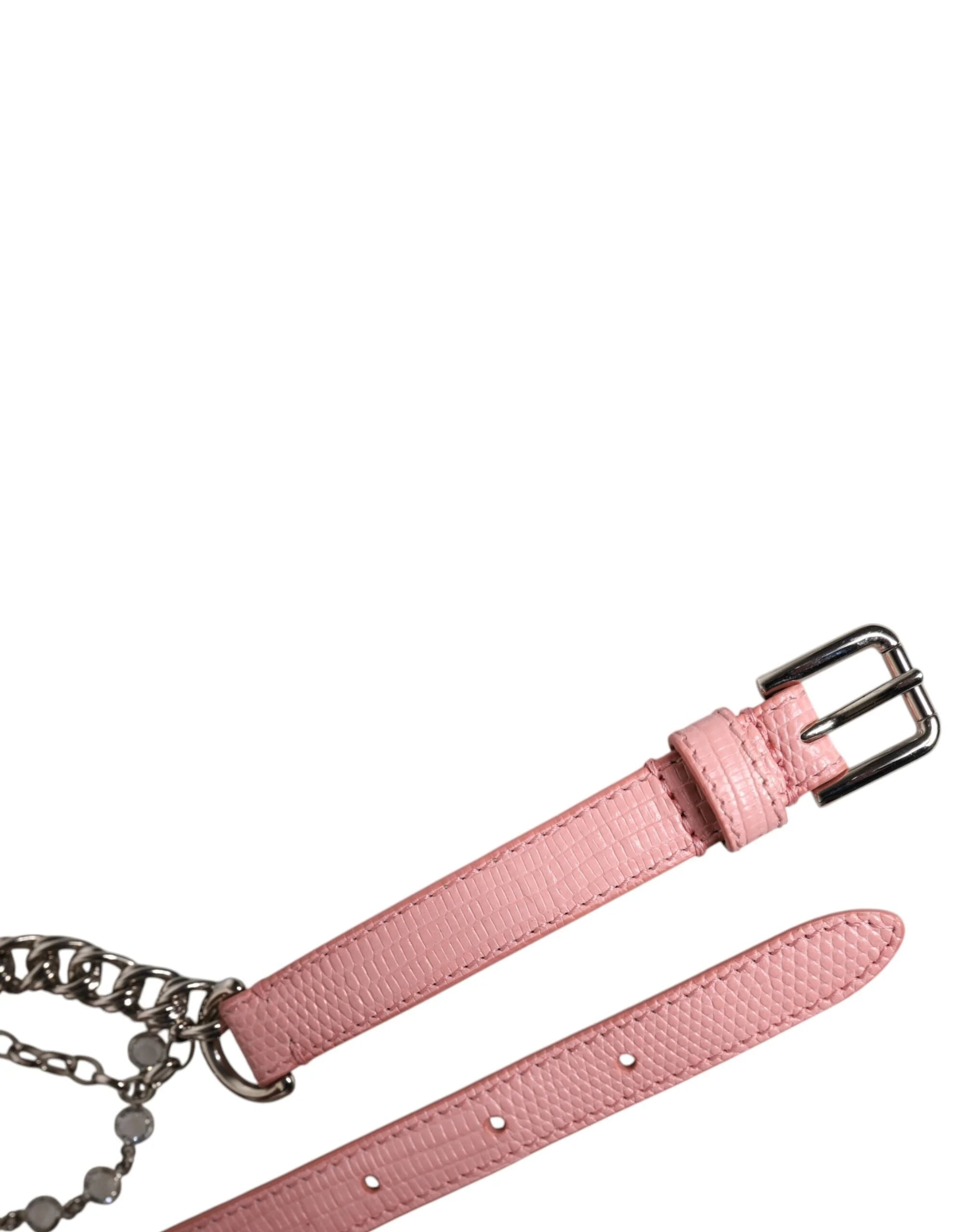 Detail shot of the gold-tone buckle and pink textured leather grain on this elegant Dolce & Gabbana designer accessory.