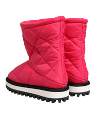 Inner side view of the luxury Dolce & Gabbana padded boots featuring a vibrant pink and white colorway.