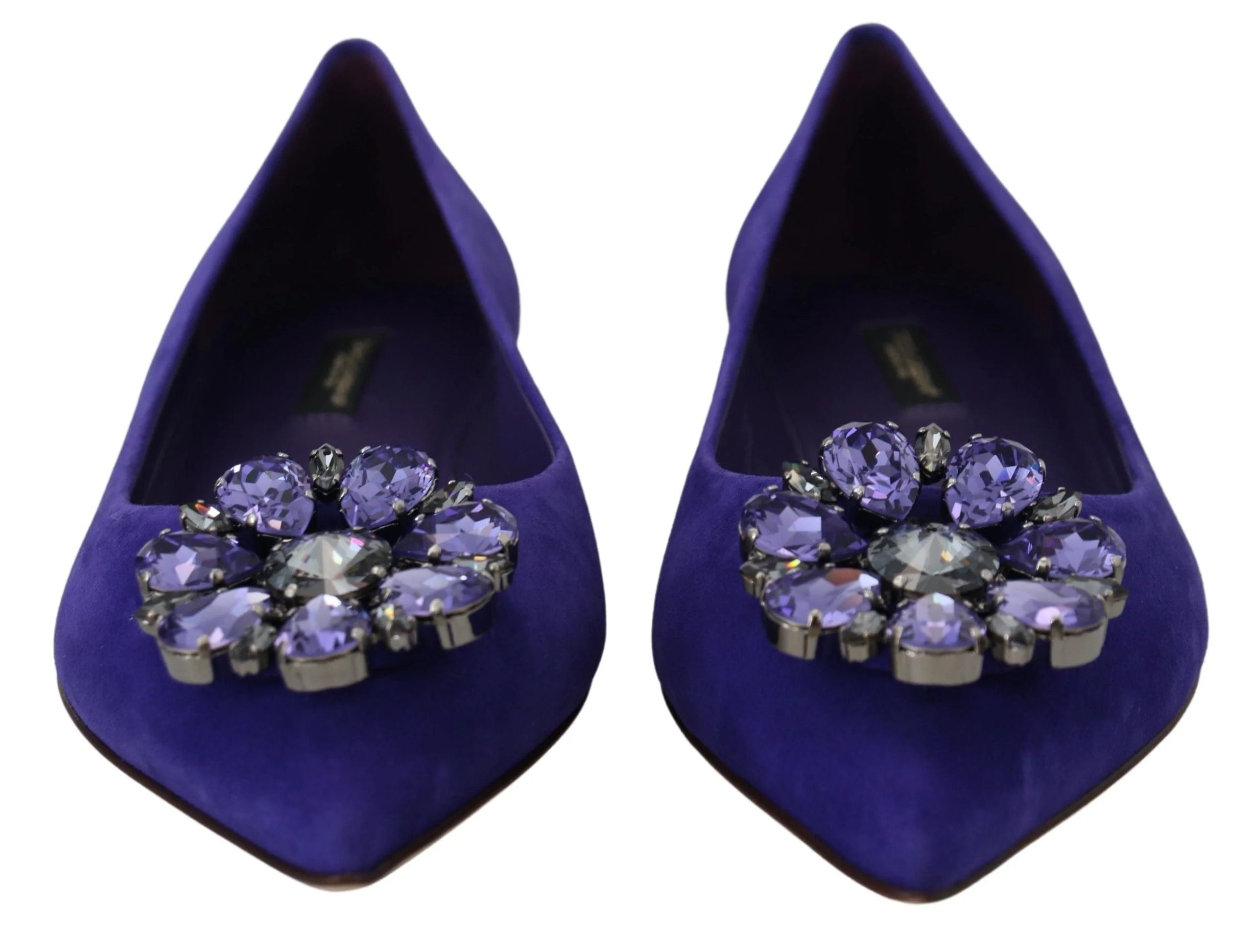 Rückansicht der luxuriösen violetten Loafer aus Ziegenleder von Dolce & Gabbana, die den strukturierten Absatz und die weiche Lederoptik hervorheben.