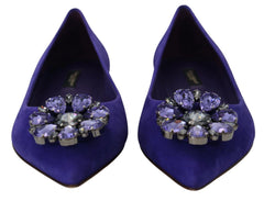 Rückansicht der luxuriösen violetten Loafer aus Ziegenleder von Dolce & Gabbana, die den strukturierten Absatz und die weiche Lederoptik hervorheben.