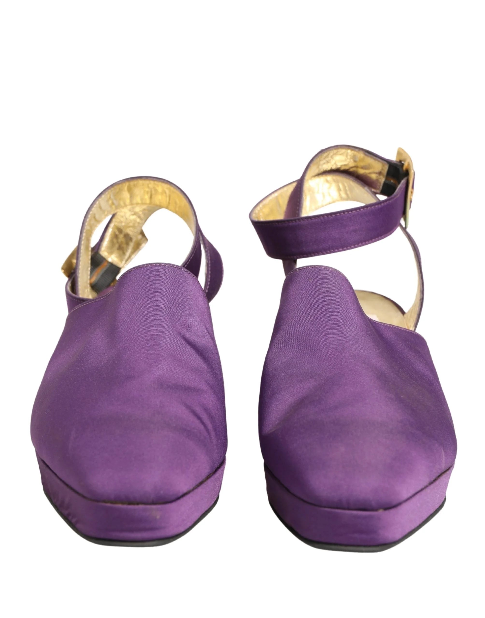 Dolce & Gabbana purple suede sandals featuring a minimalist two-strap design and elegant stiletto heel.