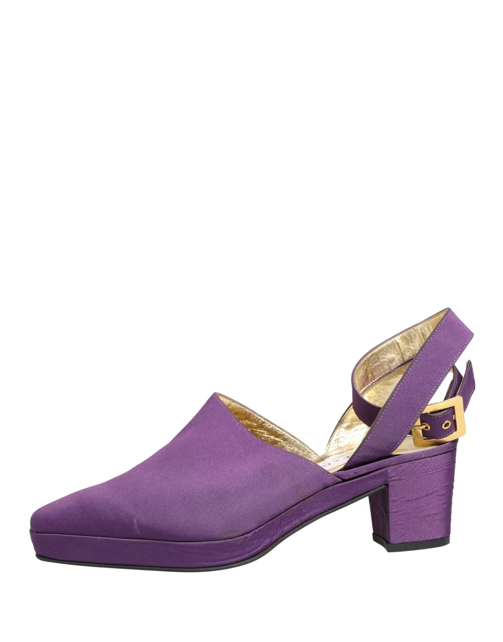 Detail of the gold-tone buckle and refined stitching on the purple suede ankle strap of Dolce & Gabbana sandals.