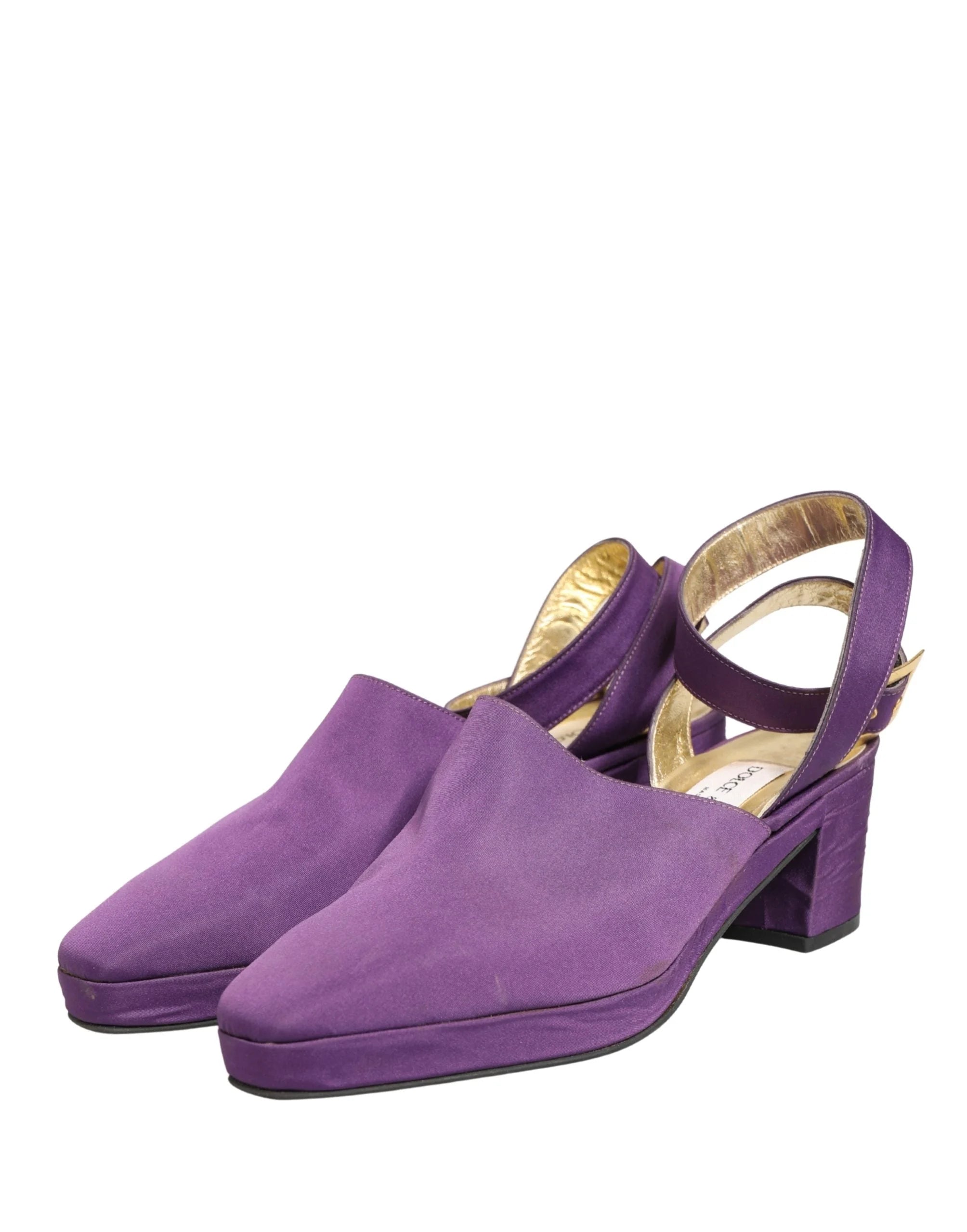 Rear view of the purple suede heel and structured ankle support of these luxury Dolce & Gabbana sandals.