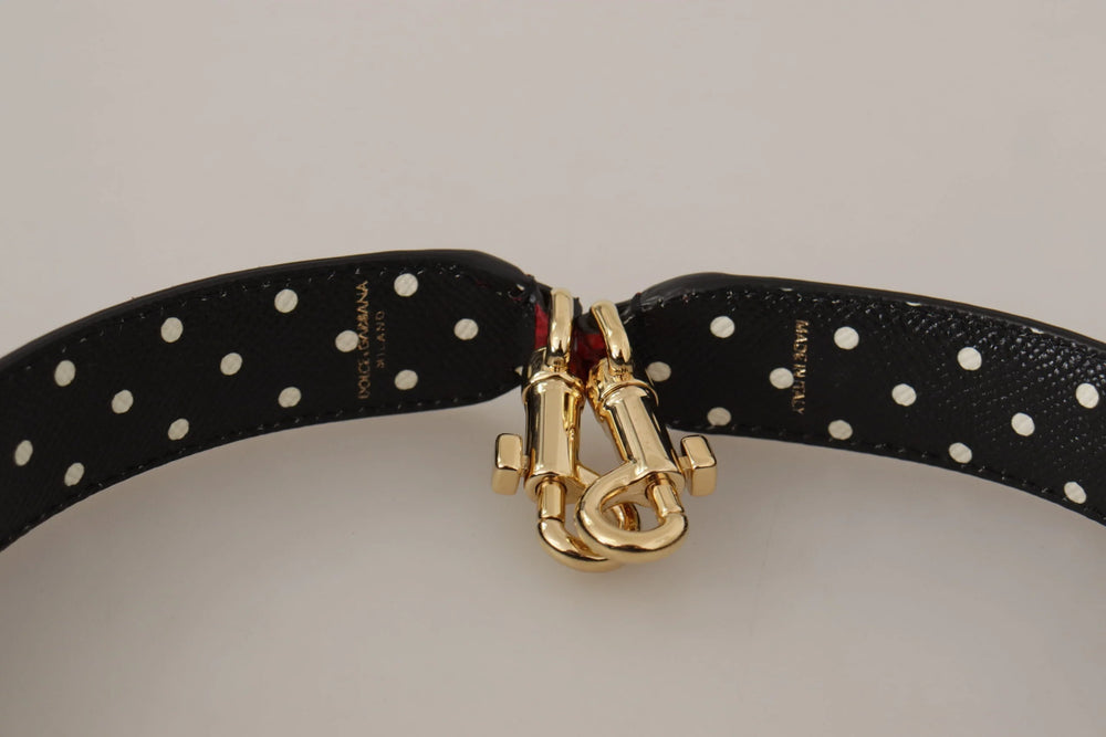 Lado reverso da correia de pitão vermelha Dolce & Gabbana mostrando o acabamento em pele lisa e a costura italiana precisa.