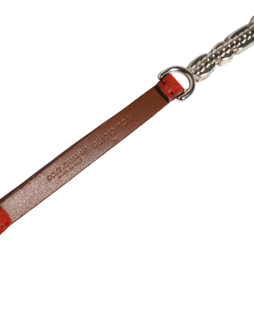 Macro view of the plush red velvet and artisanal metalwork defining this Dolce & Gabbana statement waist belt.