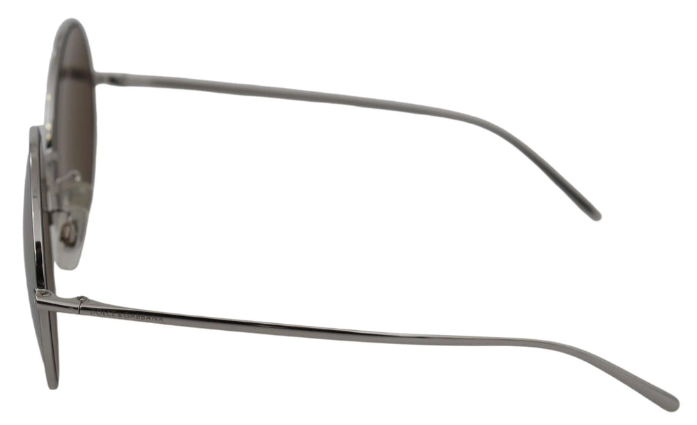 Dolce & Gabbana Damen-Sonnenbrille mit runder Form, silberfarbenen Metallrahmen und elegantem grauen Tönung.