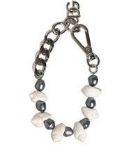 Achterkant van de Dolce & Gabbana schelpendecoratie armband, waarbij de veilige kreeftscharnier en verstelbare schakels worden benadrukt.