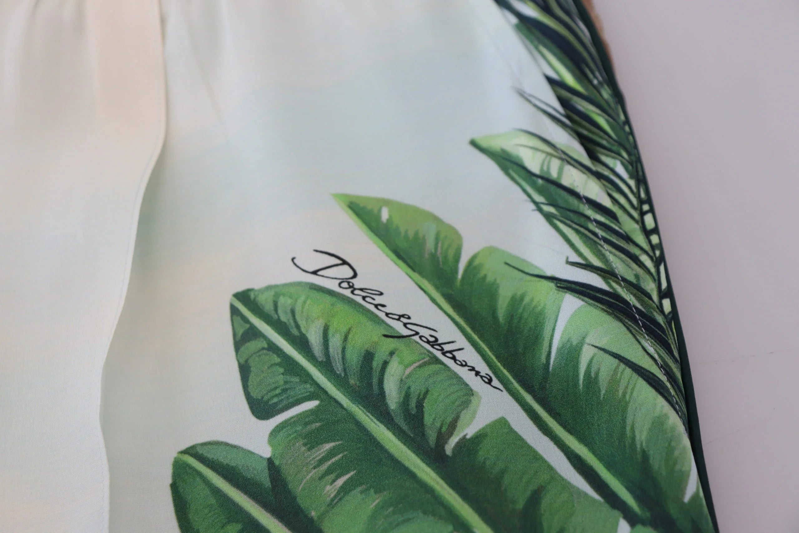 Dolce & Gabbana White Floral Printed Men Jogger Pants - IT48 | M - Joggers