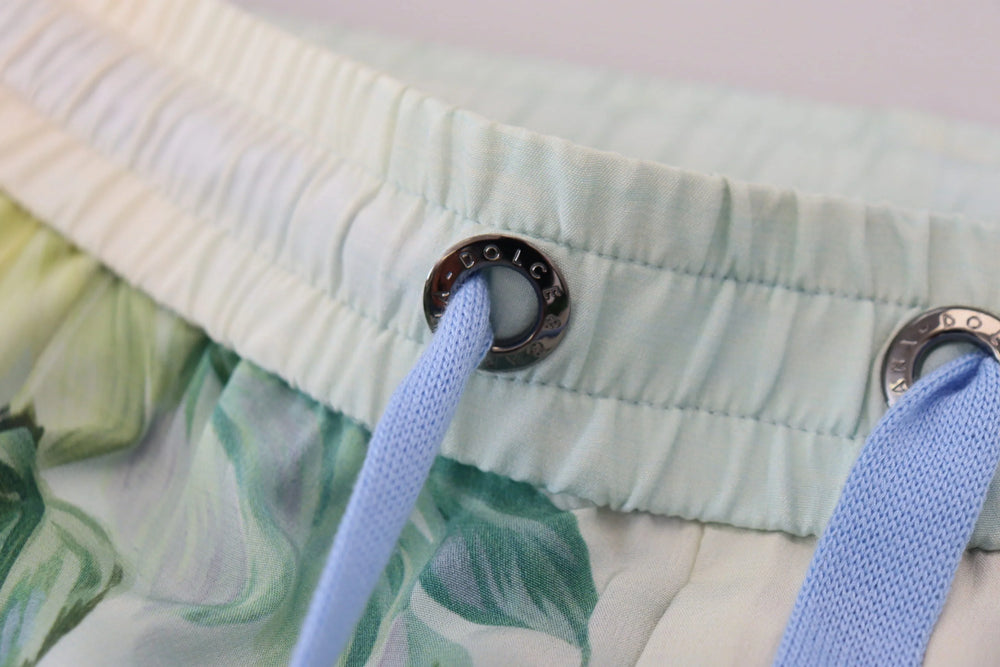 Dolce & Gabbana White Floral Printed Men Jogger Pants - IT48 | M - Joggers