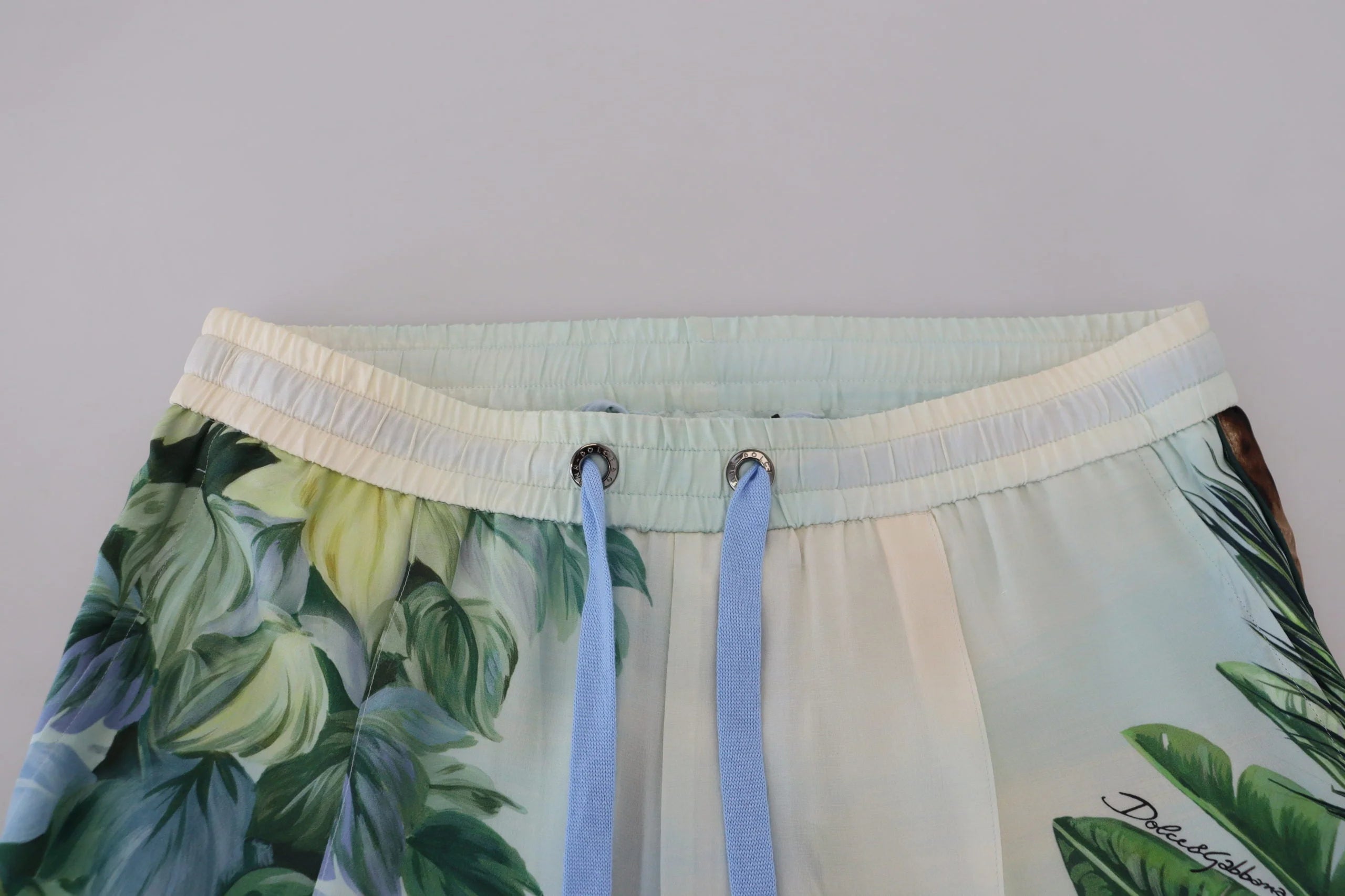 Dolce & Gabbana White Floral Printed Men Jogger Pants - IT48 | M - Joggers