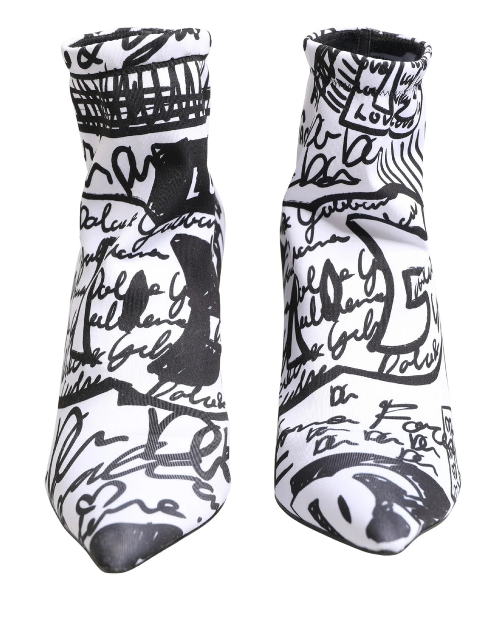 Oversiktsbilde av Dolce & Gabbana hvite graffiti-støvler, som avslører det merkede innvendige lærinnlegget.