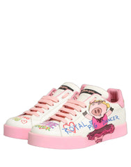 Rear view of Portofino sneakers showing the pink heel tab and Dolce & Gabbana branding on the white rubber sole.