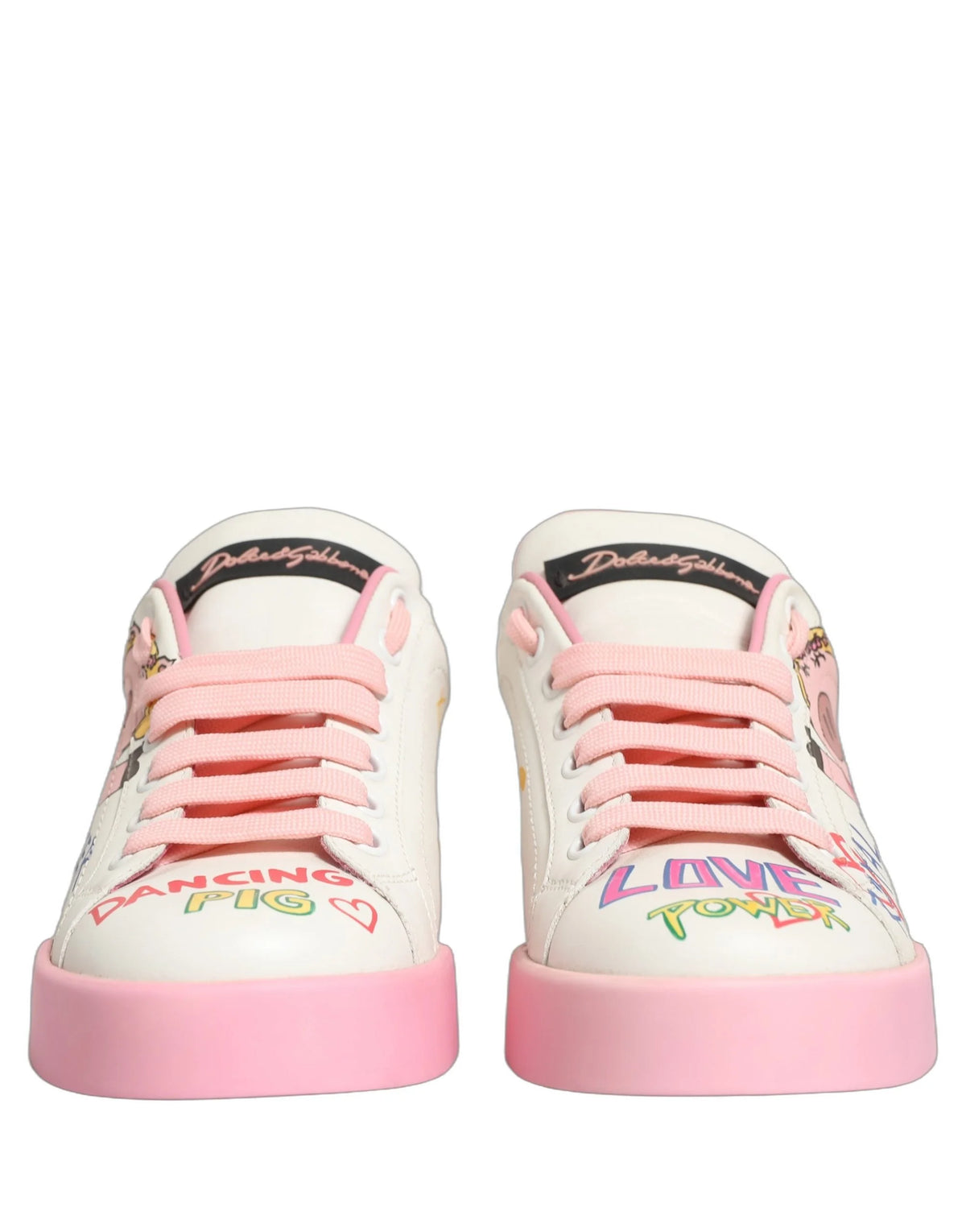 Dolce & Gabbana Portofino low top sneakers in white calf leather featuring pink Royal Pig graphics and logo details.