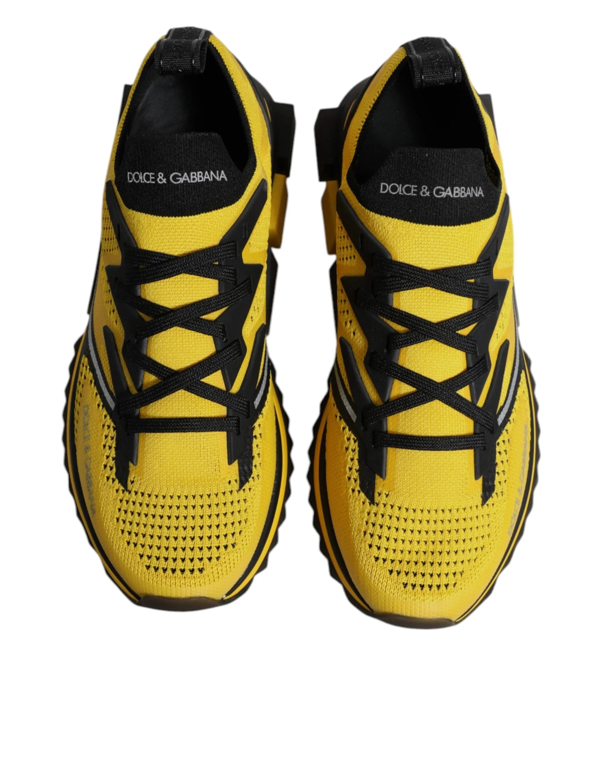 Zijaanzicht van Dolce & Gabbana Sorrento sport sneakers voor heren met een geometrische architectonische zool in wit en zwart.