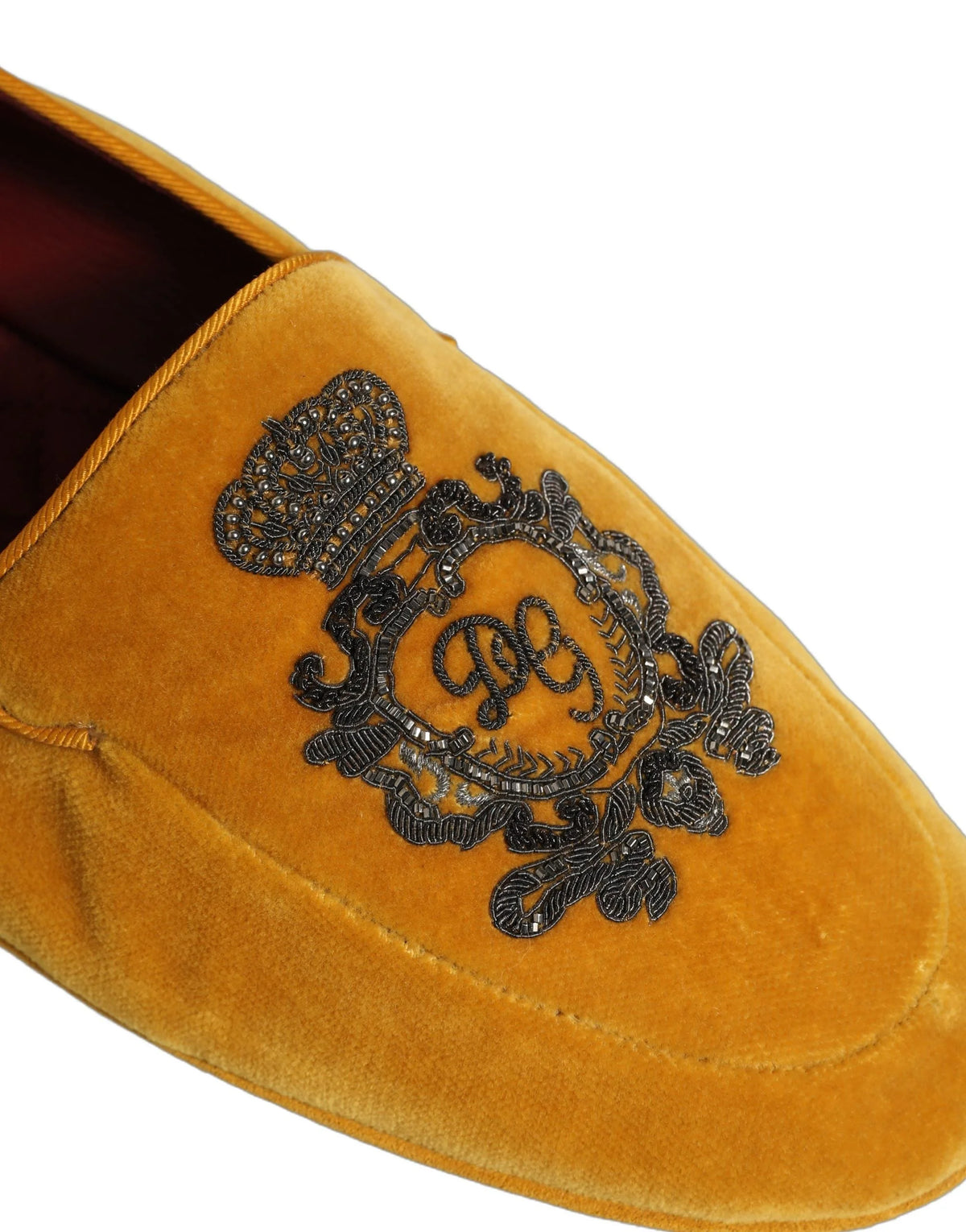 Dolce & Gabbana men's loafers in yellow velvet featuring an intricate gold crown embroidery on the vamp.