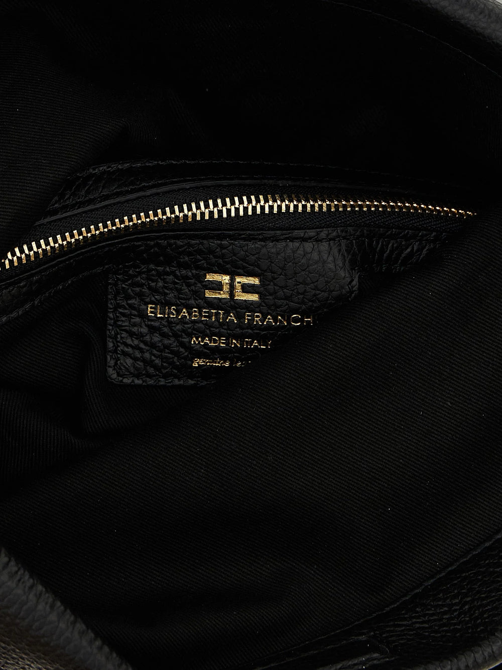 Close-up of the Elisabetta Franchi logo hardware and fine grain texture on the premium black calfskin leather.