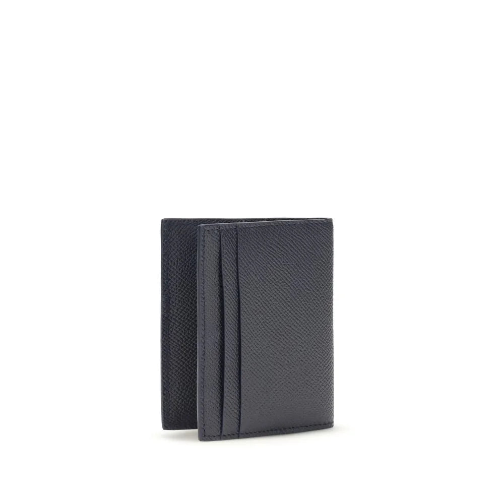 Interior view of the Ferragamo blue leather wallet showing organized card slots and premium Italian craftsmanship.