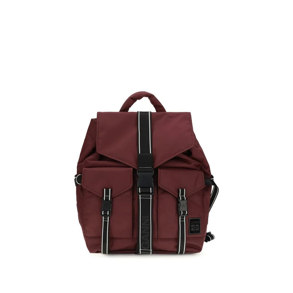 Ganni Bordeaux recycled polyamide backpack featuring a front buckle closure and signature logo patch in deep burgundy.