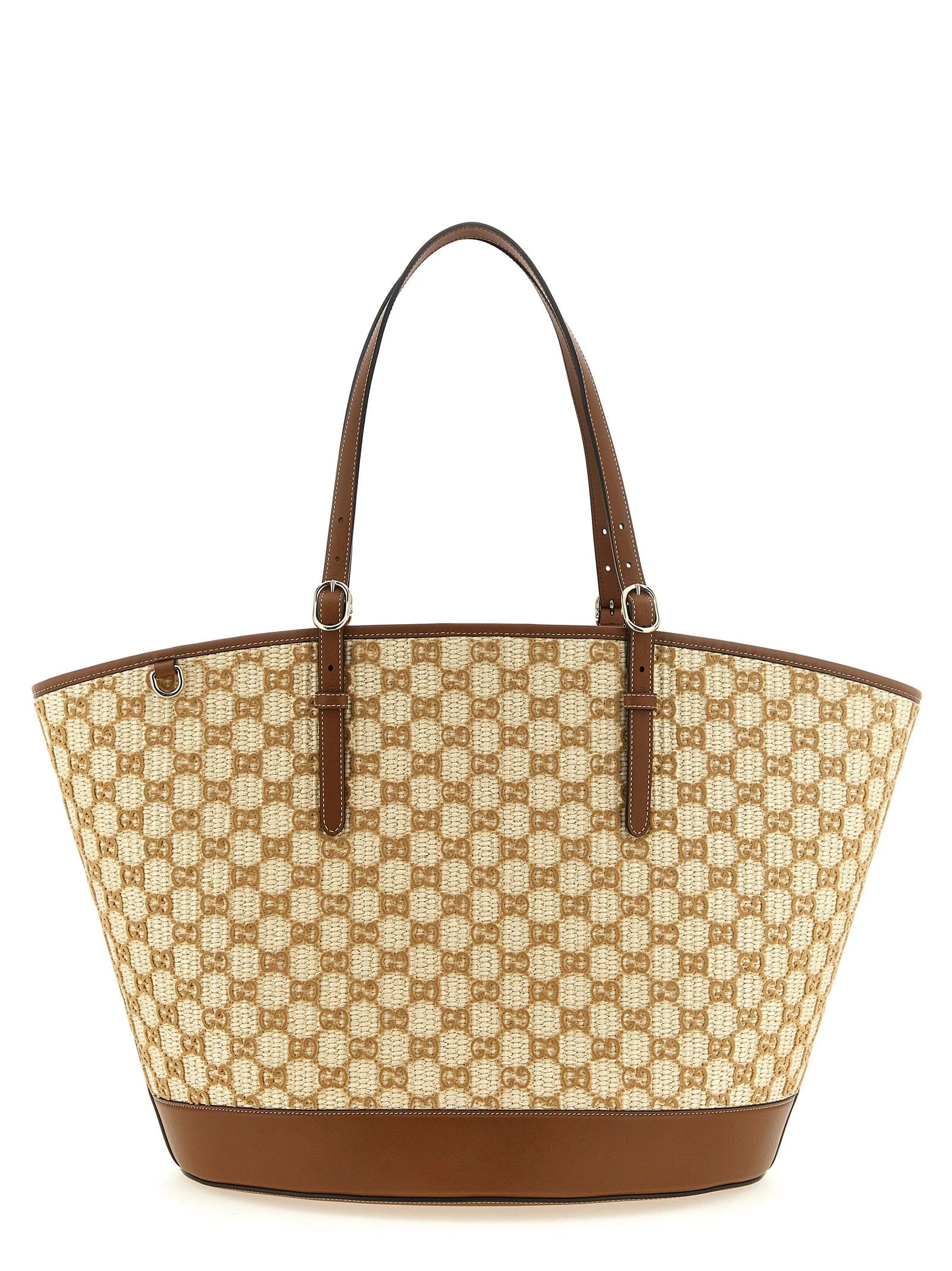 Front view of a Gucci brown cotton handbag featuring the iconic GG monogram pattern and structured leather trim.