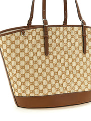 Rear view of the Gucci monogram cotton bag highlighting the seamless pattern alignment and luxury craftsmanship.