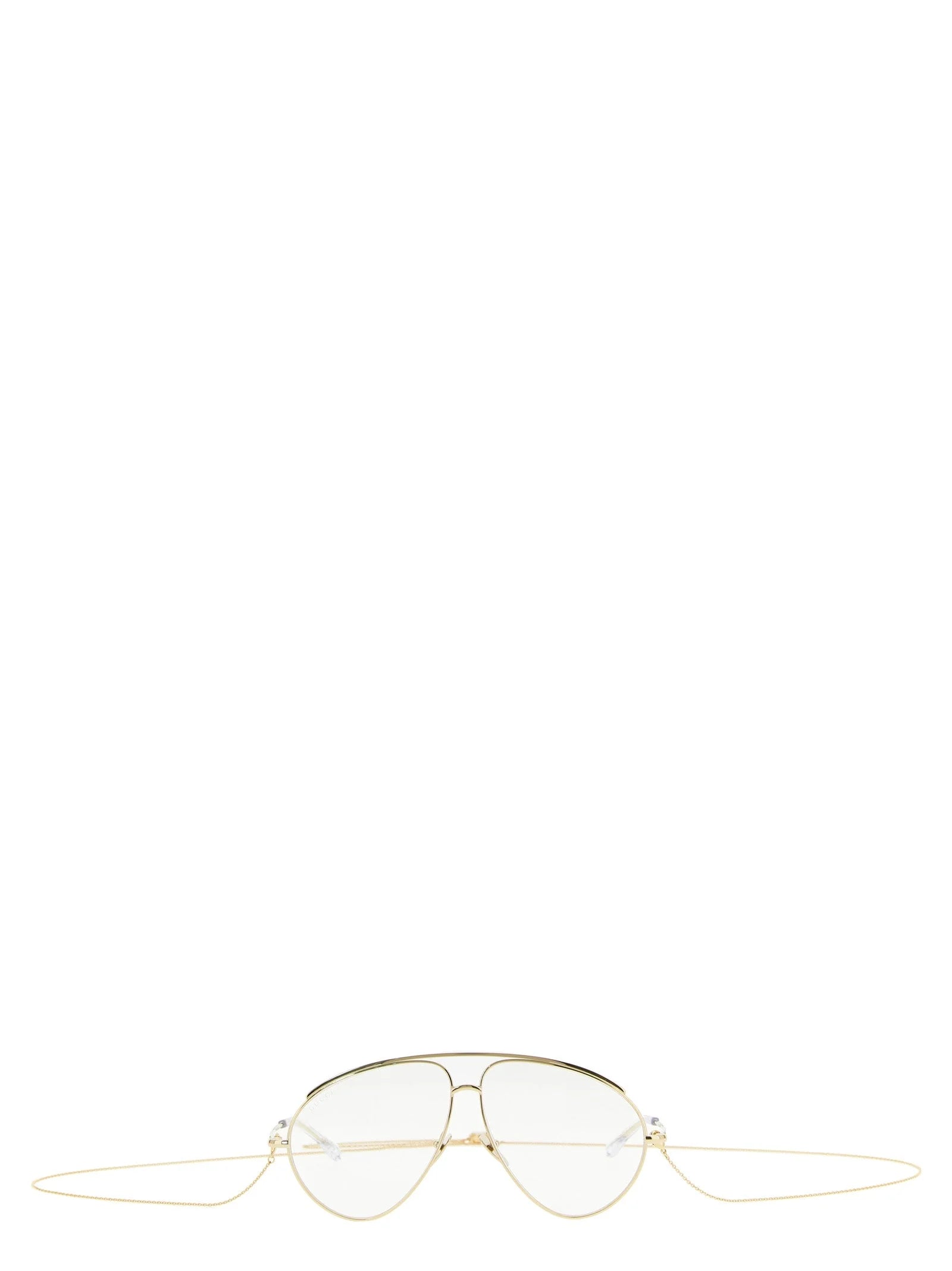Pohled na dámské sluneční brýle Gucci se zlatými polyamidovými obroučkami a elegantní, oversized siluetou.