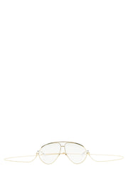 Pohled na dámské sluneční brýle Gucci se zlatými polyamidovými obroučkami a elegantní, oversized siluetou.