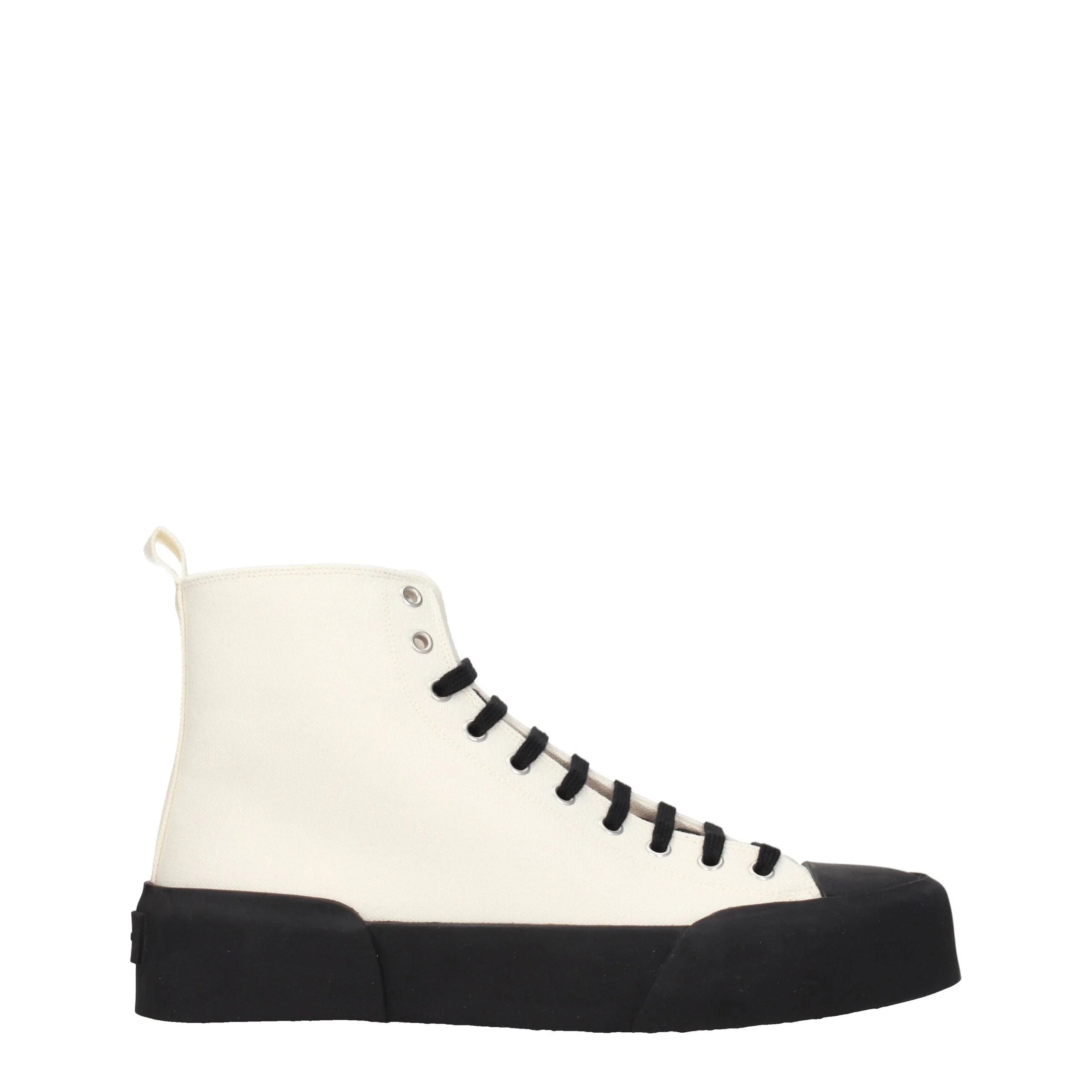 Baskets montantes en tissu beige Jil Sander dotées d'une empeigne minimaliste en toile et d'une semelle en caoutchouc nervurée surdimensionnée.